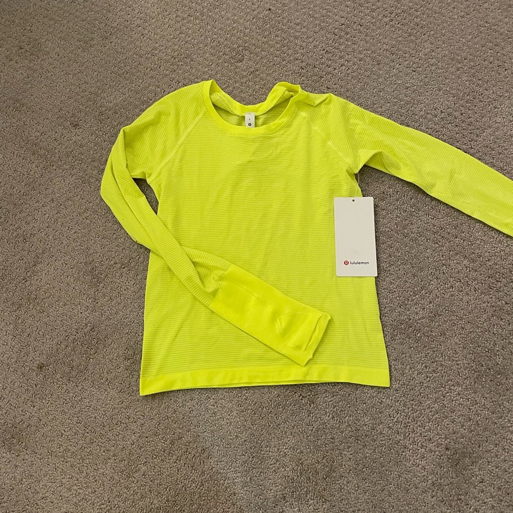 Lululemon Swiftly Tech neon long sleeve top for workout etc.